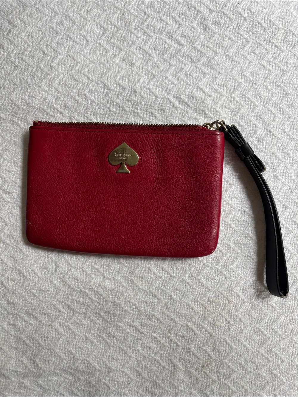 kate spade Red Leather Wristlet with Black Strap and Gold Spade Logo